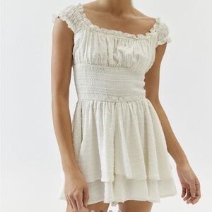 UO ROSIE SMOCKED TIERED RUFFLE ROMPER